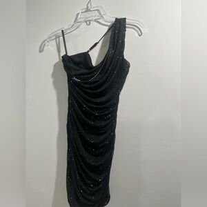Medium one shoulder sparkley tight black dress